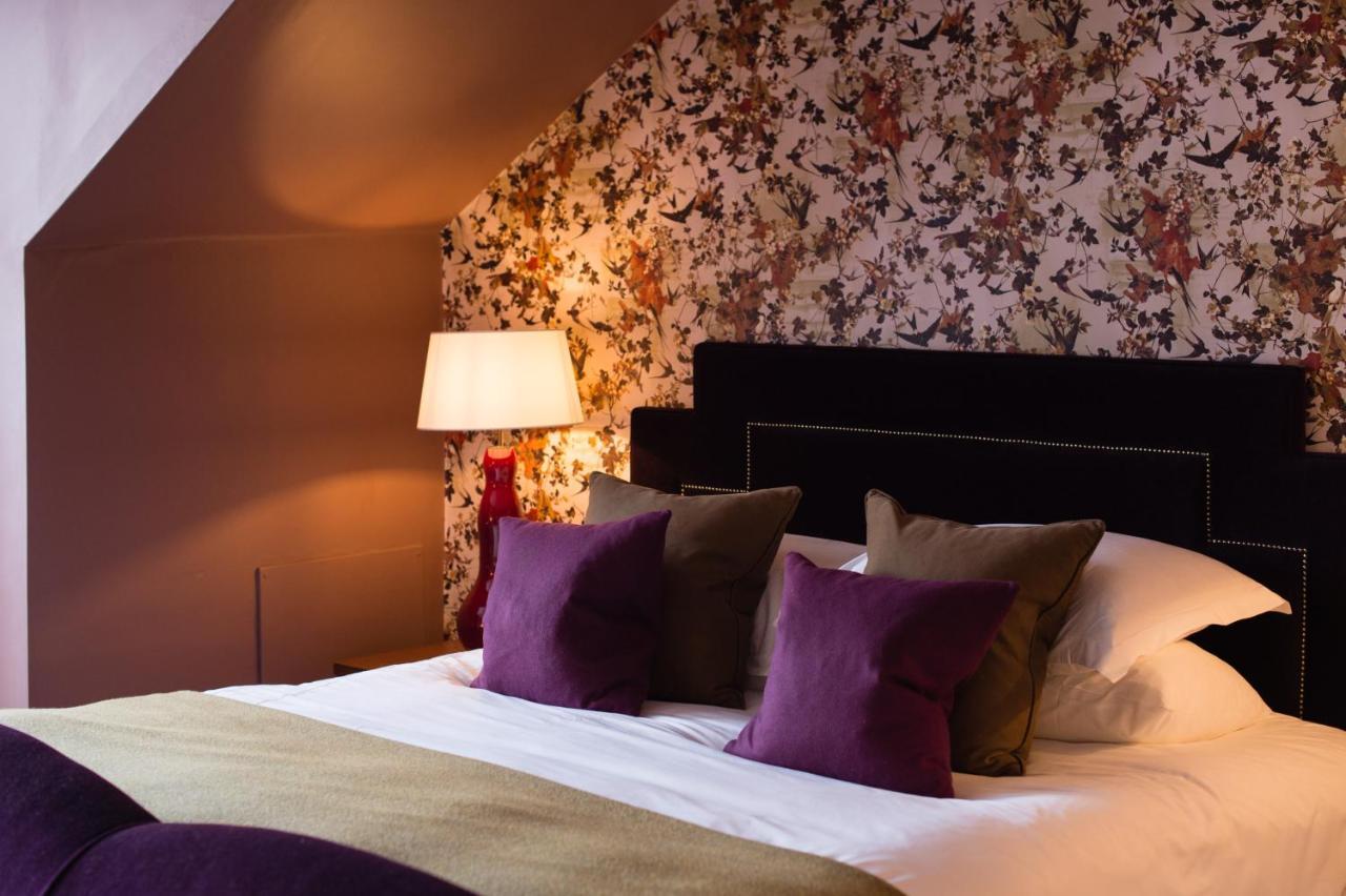 德文郡花园杜文酒店 格拉斯哥 外观 照片 A bedroom at the hotel