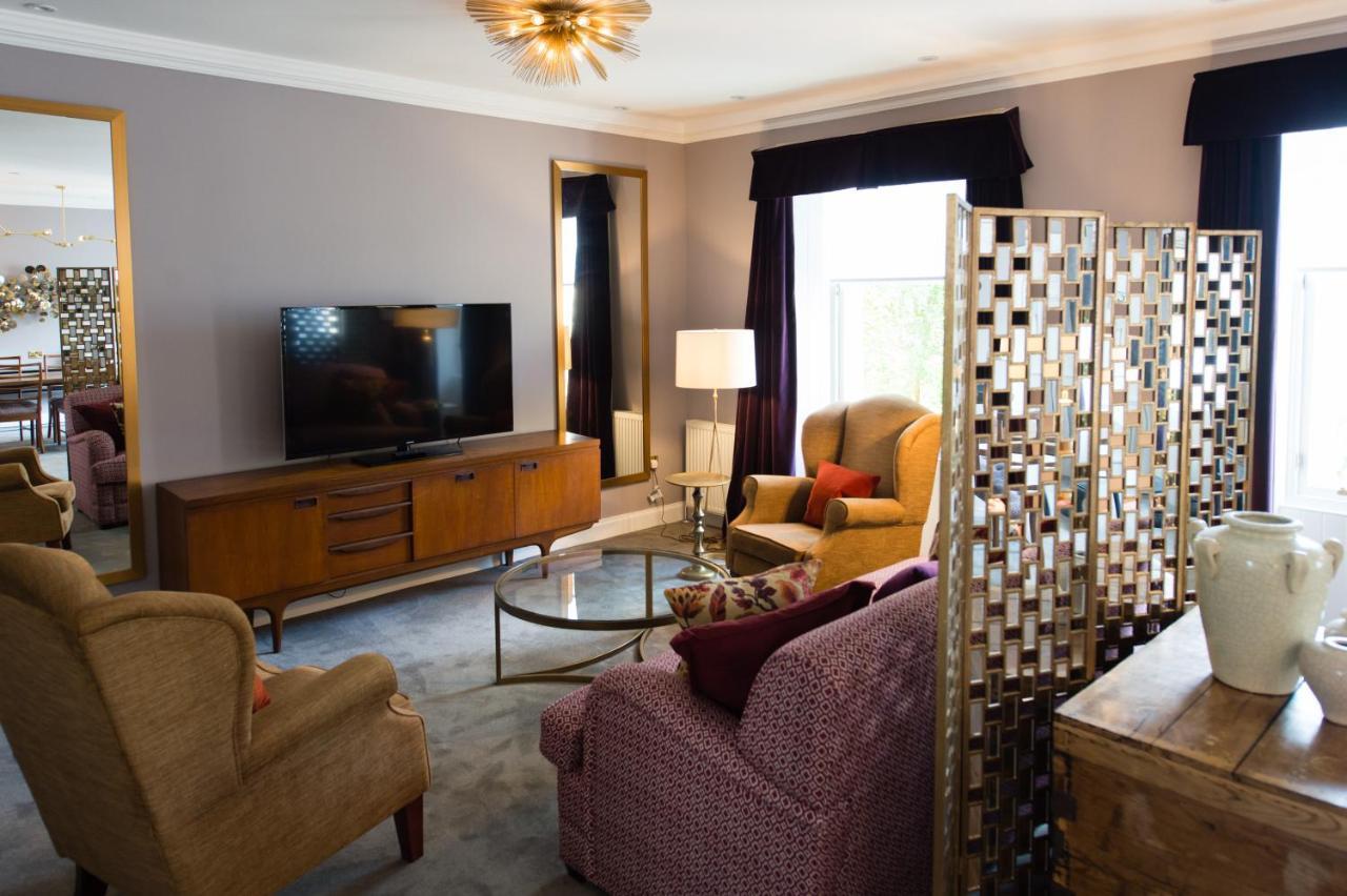 德文郡花园杜文酒店 格拉斯哥 外观 照片 A living room in a typical apartment at The Carlyle