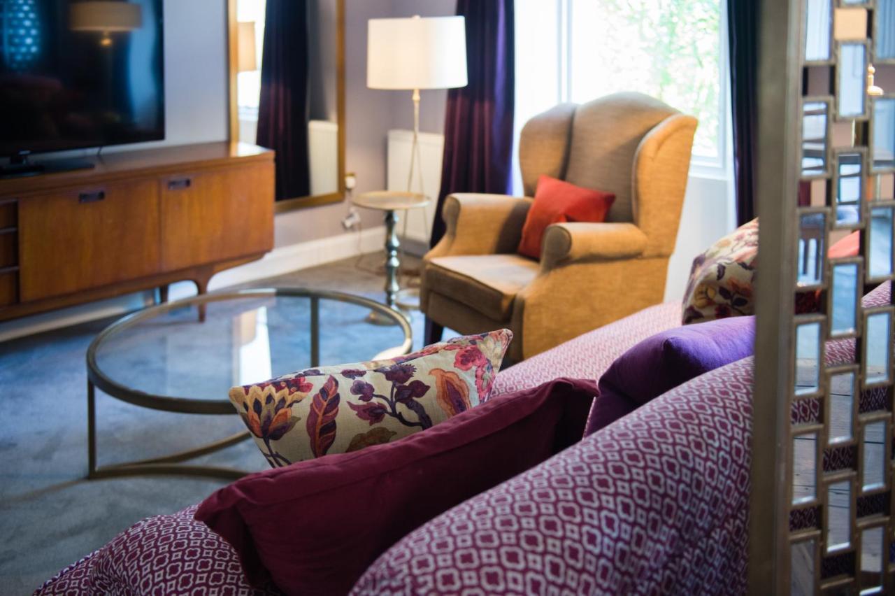 德文郡花园杜文酒店 格拉斯哥 外观 照片 A living room at the Hotel Indigo in San Francisco